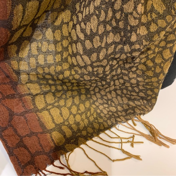 Animal print scarf with fringe. Scarf has a nice Sheen /sparkle. Approx. 64” - Picture 2 of 7